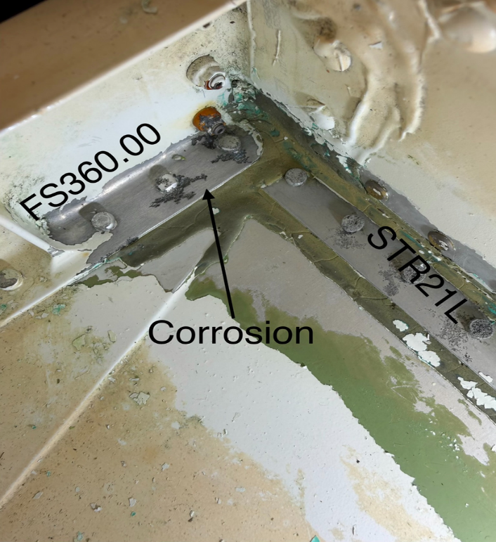 Corrosion on the main entry area frame and stringer of a Challenger 300