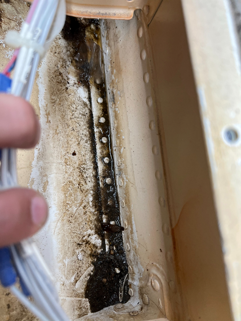 Water and contamination trapped along the structure due to ineffective drainage routing