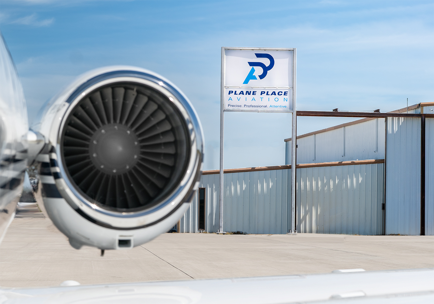 Plane Place Aviation sign at the hangar entrance in Cleburne, Texas