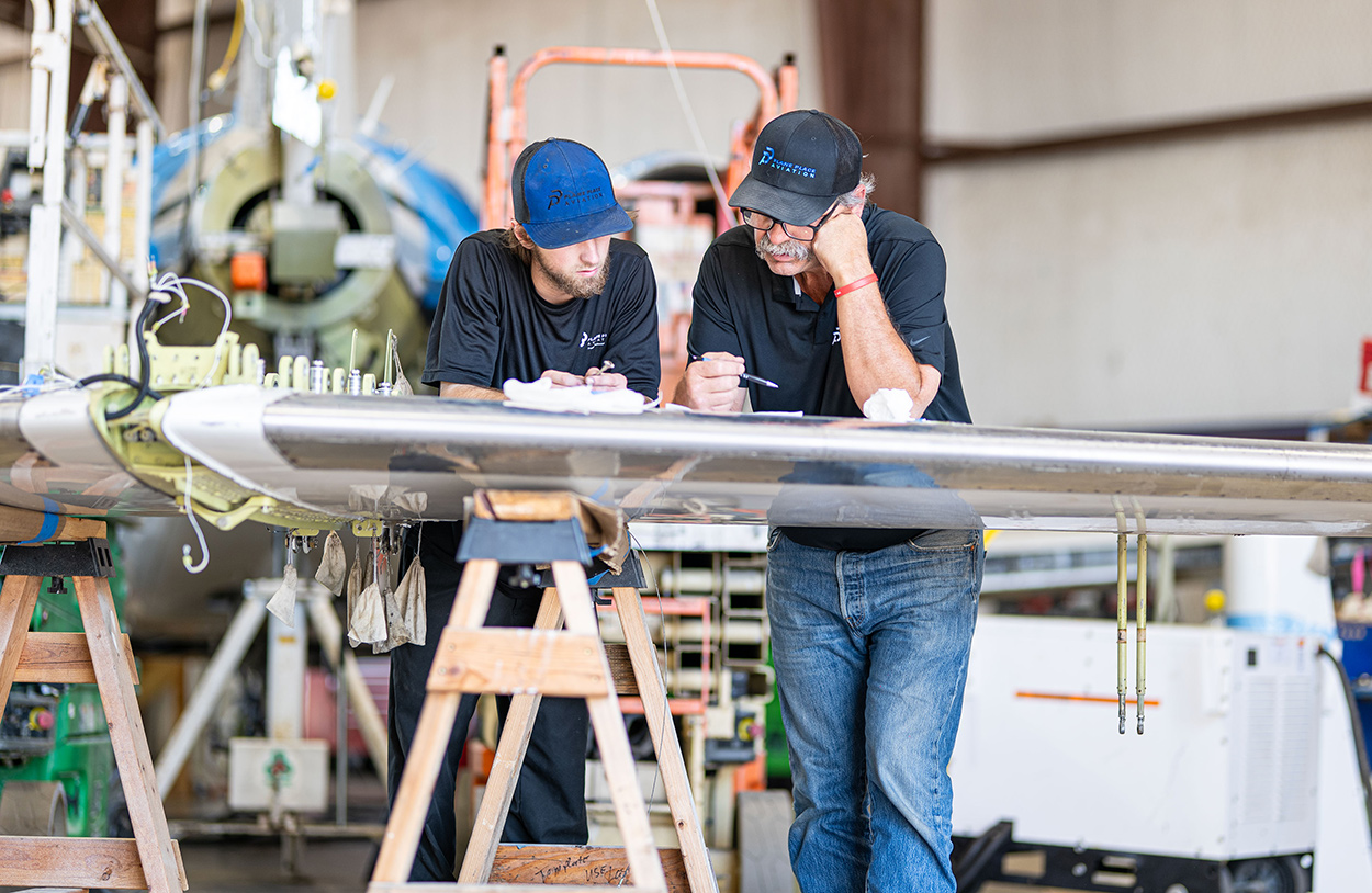 Maintenance work in the Plane Place Aviation hangar