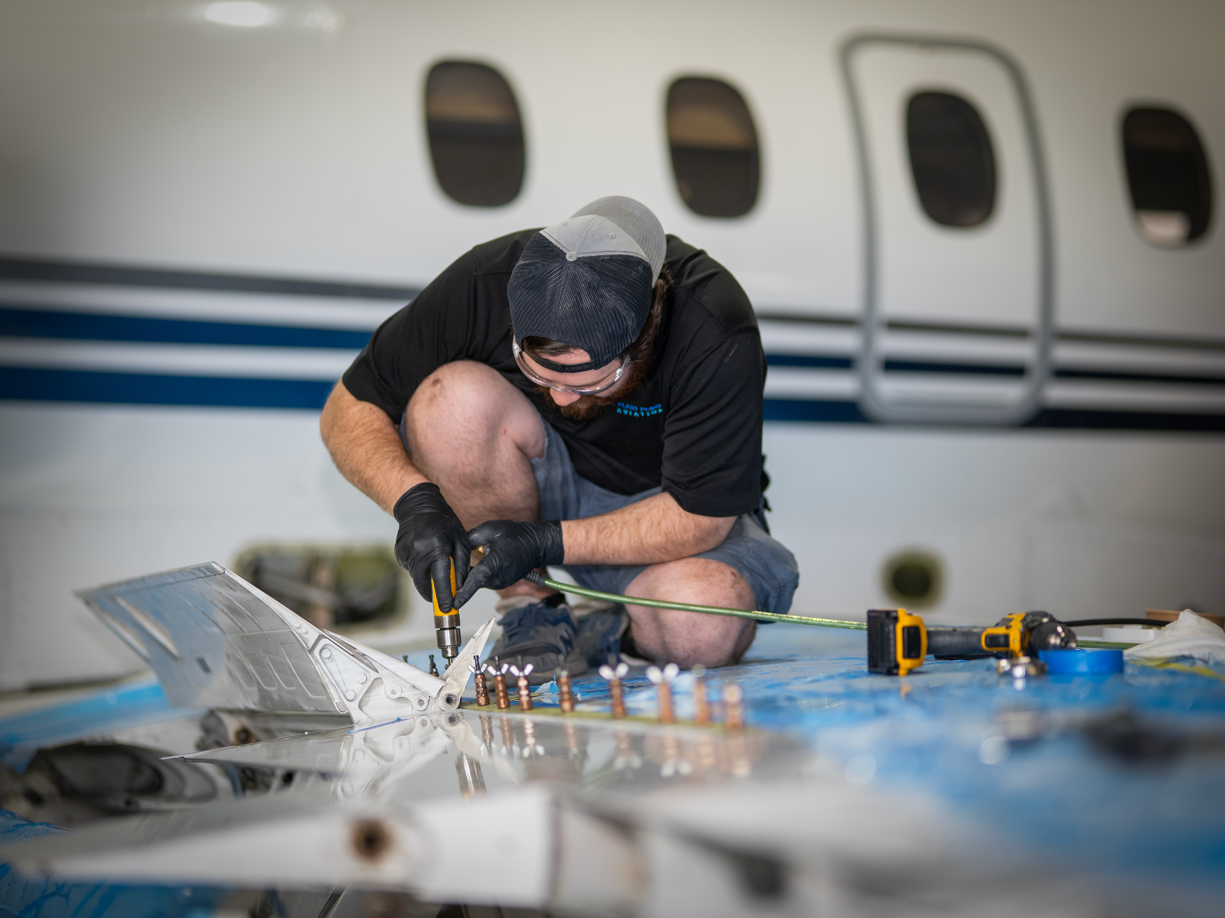 PPA technicians collaborating on winglet structural work in the Cleburne hangar