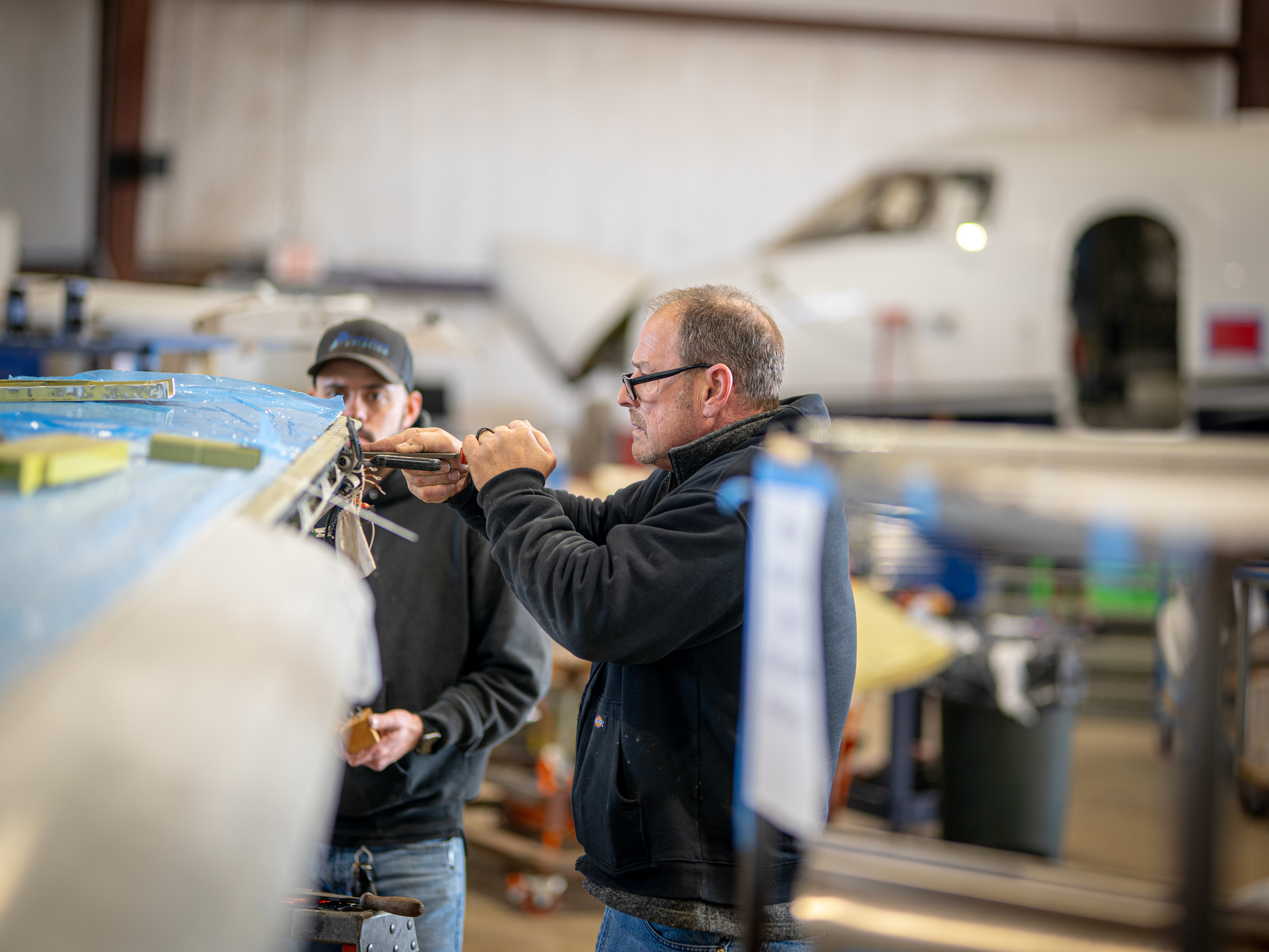 PPA technician James performing detailed winglet work in the Cleburne hangar