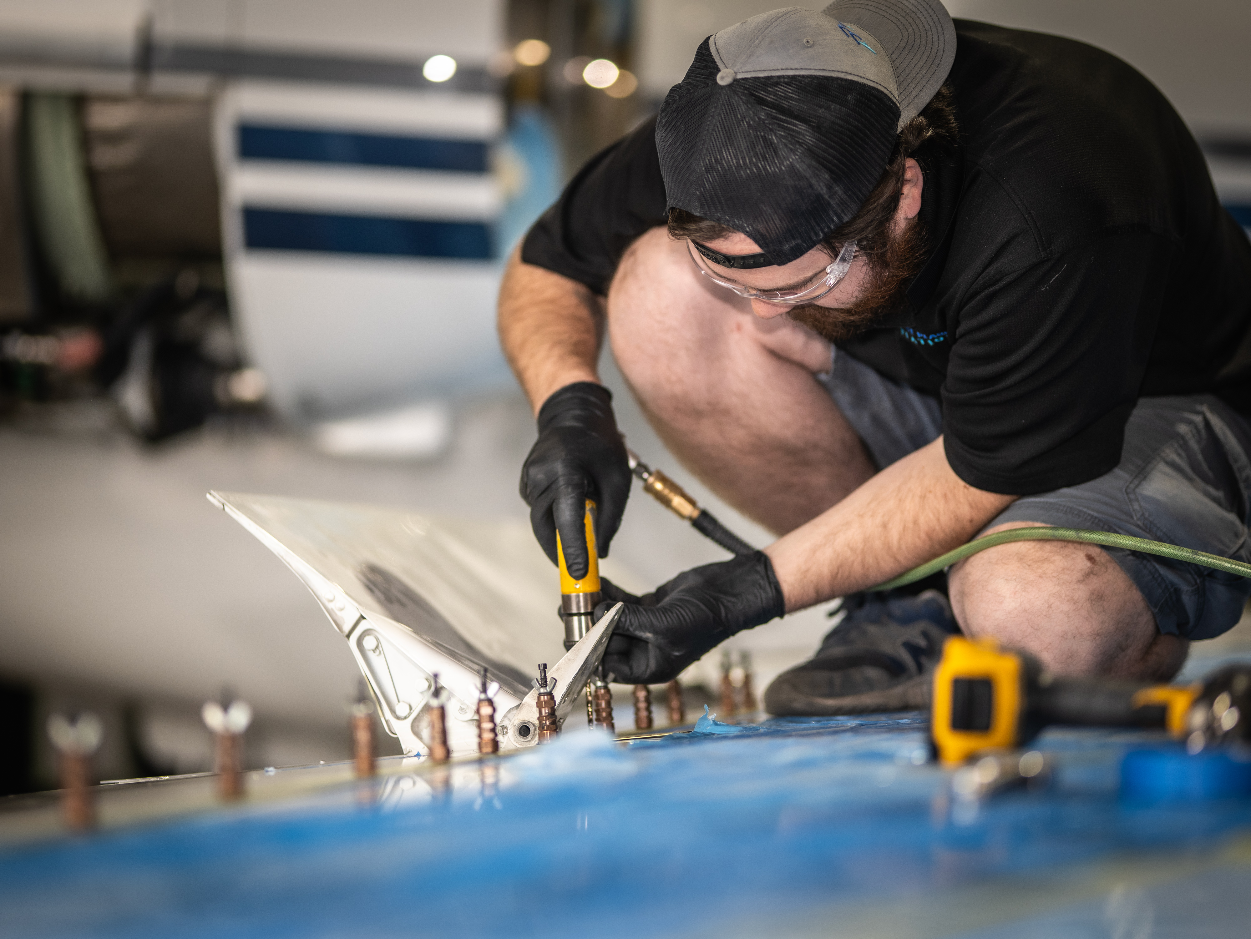 PPA technician riveting structural components on a Challenger winglet